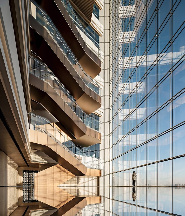 Goettsch Partners Completes Dual-Tower Headquarters Complex With Transparent "Sky Village" at the Top image 4