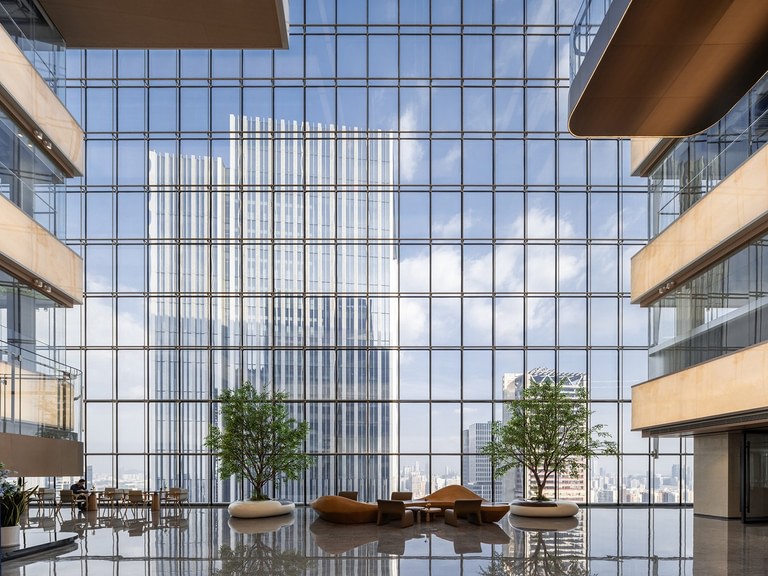 Goettsch Partners Completes Dual-Tower Headquarters Complex With Transparent "Sky Village" at the Top image 6