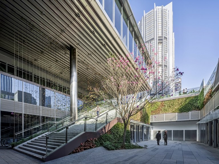 Goettsch Partners Completes Dual-Tower Headquarters Complex With Transparent "Sky Village" at the Top image 11